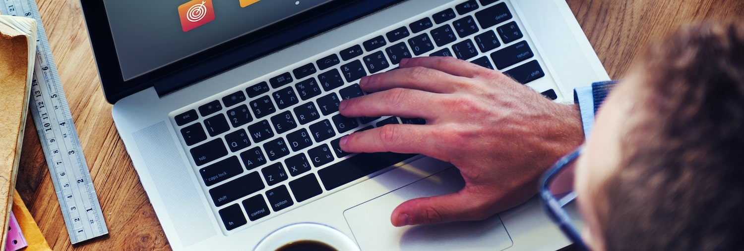 Man looking for conenient mac shortcut to be more productive by marketing refresh in houston, texas.