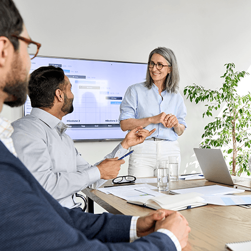 A digital marketing consultant in Houston meeting with clients