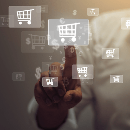 Marketer pointing to a graphic representing a digital shopping cart looking to increase Ecomm sales