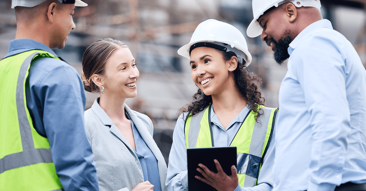 Construction team meeting together at the job site with the support of B2B marketing professionals