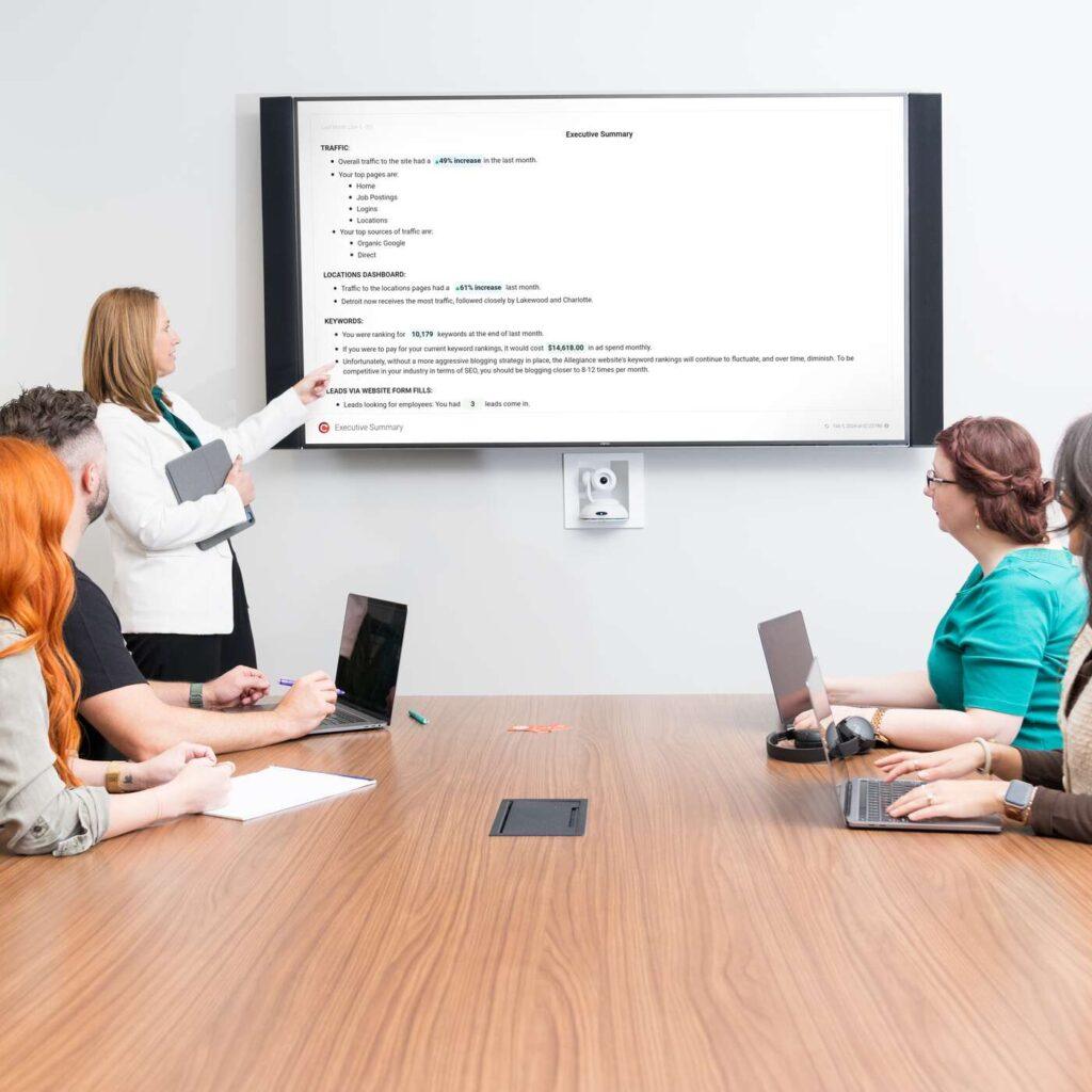 Marketing Refresh Team At A Meeting