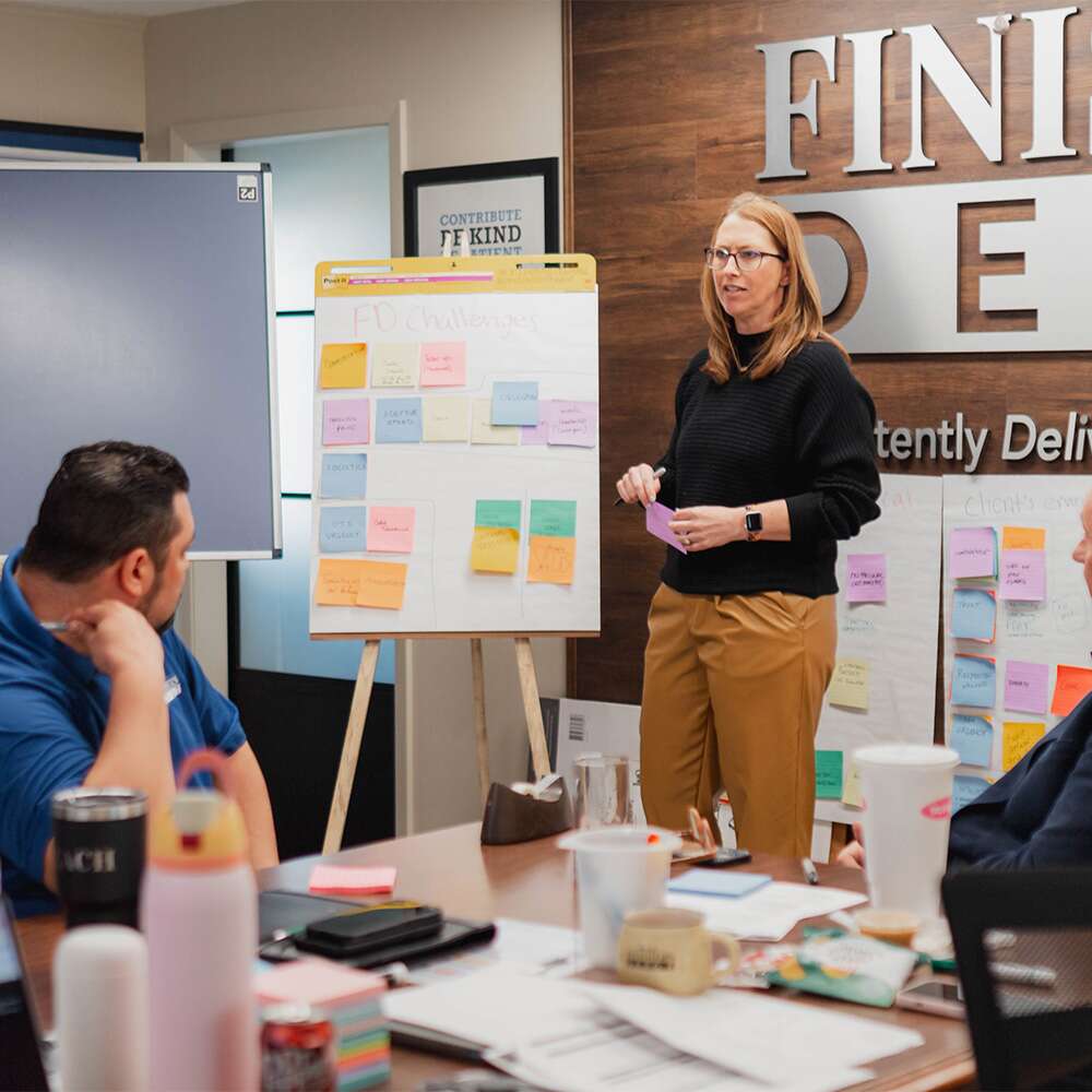 Terri Hoffman At The Finishers Depot Offices Discussing Their Marketing Strategy