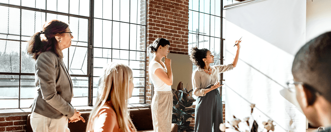 Marketing team brainstorming ways to attract B2B customers